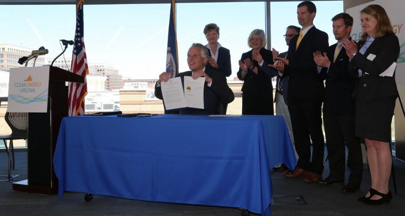 McAuilffe Signs Executive Directive 11 Reducing Carbon Dioxide Emissions From Electric Power Facilites and Growing Virginia's Clean Energy Economy 